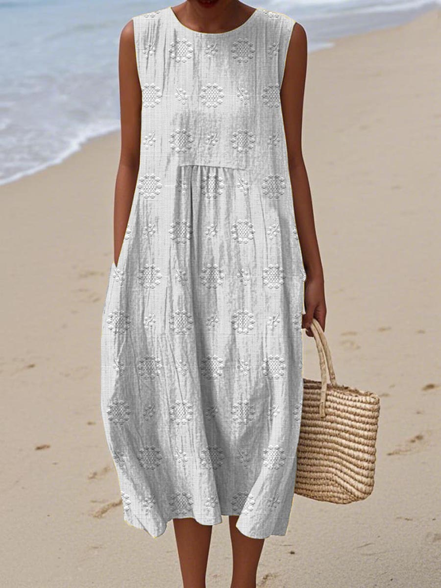 YARAÉ | SLEEVELESS COTTON DRESS WITH POCKETS
