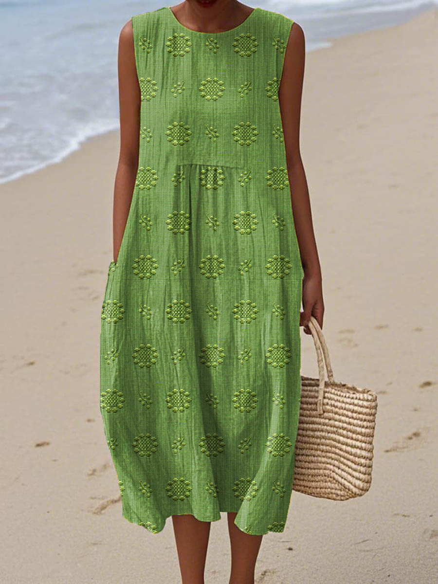 YARAÉ | SLEEVELESS COTTON DRESS WITH POCKETS